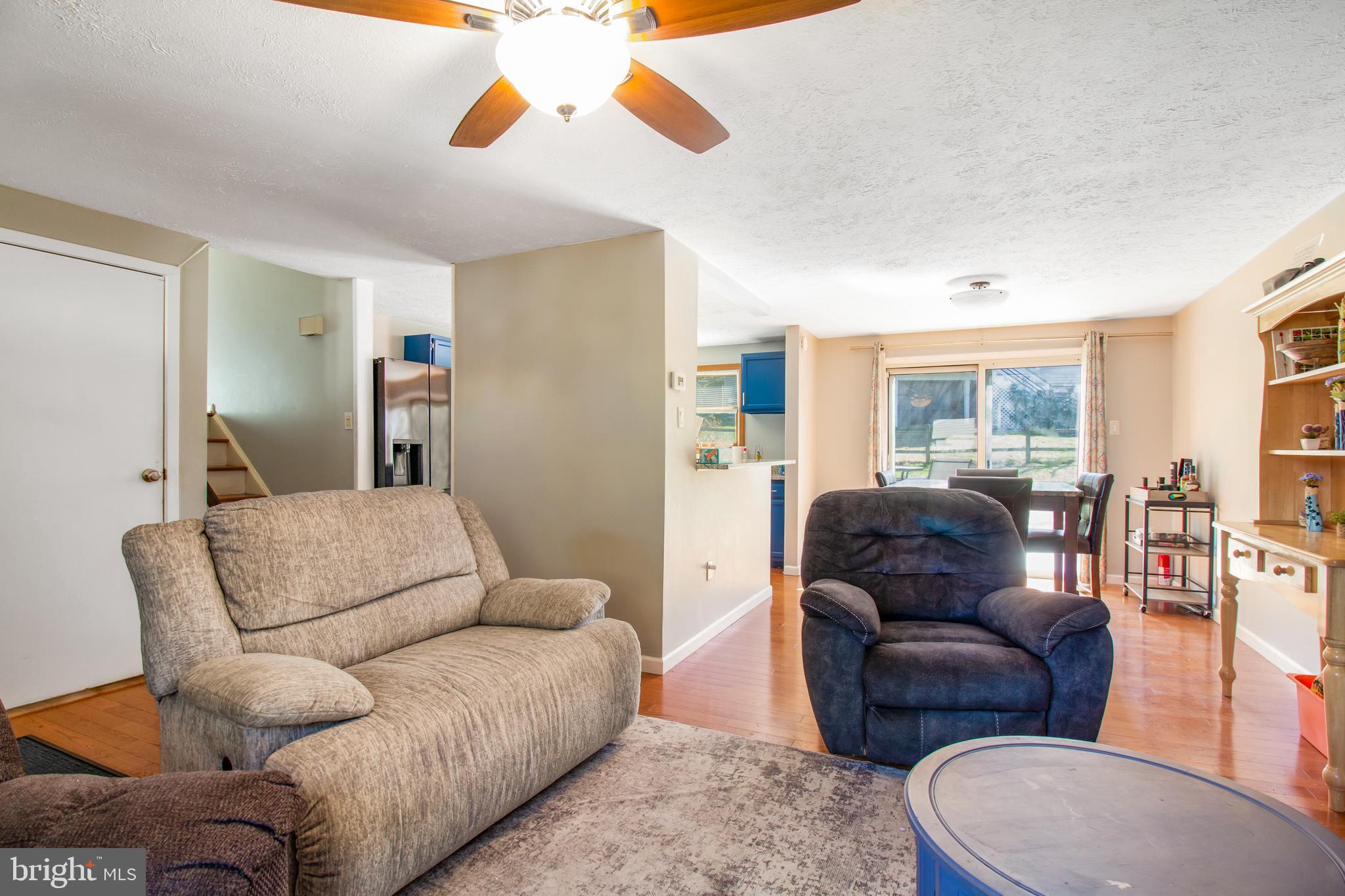 7009 Deepage Drive Columbia, MD 21045 - Photo 3 of 34 a living room with furniture and a large window