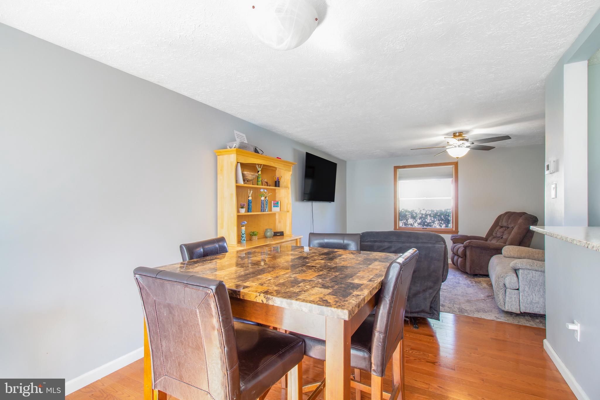 7009 Deepage Drive Columbia, MD 21045 - Photo 7 of 34 a view of a dining room with furniture