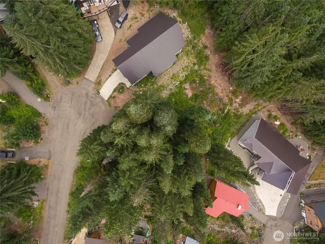 an aerial view of house with yard