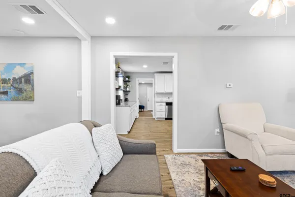 a bedroom with furniture and a couch