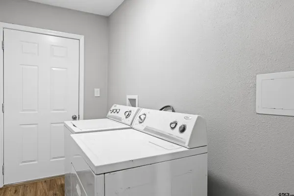 a utility room with dryer and washer