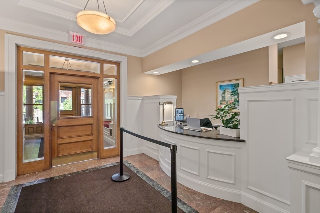416 Marlborough Street, Unit 501 Boston, MA 02115 - Photo 3 of 12 a view of a hallway with workspace