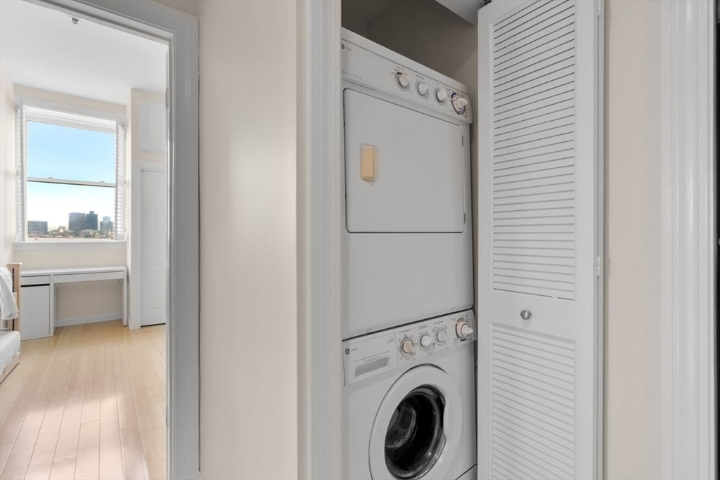 416 Marlborough Street, Unit 501 Boston, MA 02115 - Photo 9 of 12 a utility room with dryer and washer