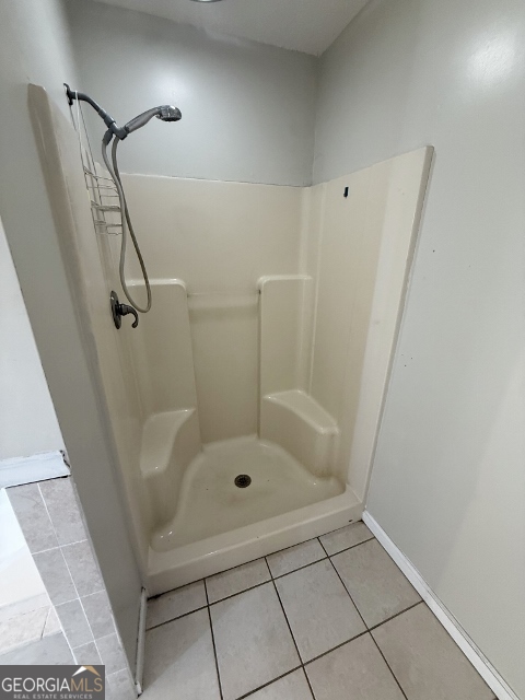 451 Lambs Bridge Road Swainsboro, GA 30401 - Photo 11 of 23 a bathroom with a bath tub