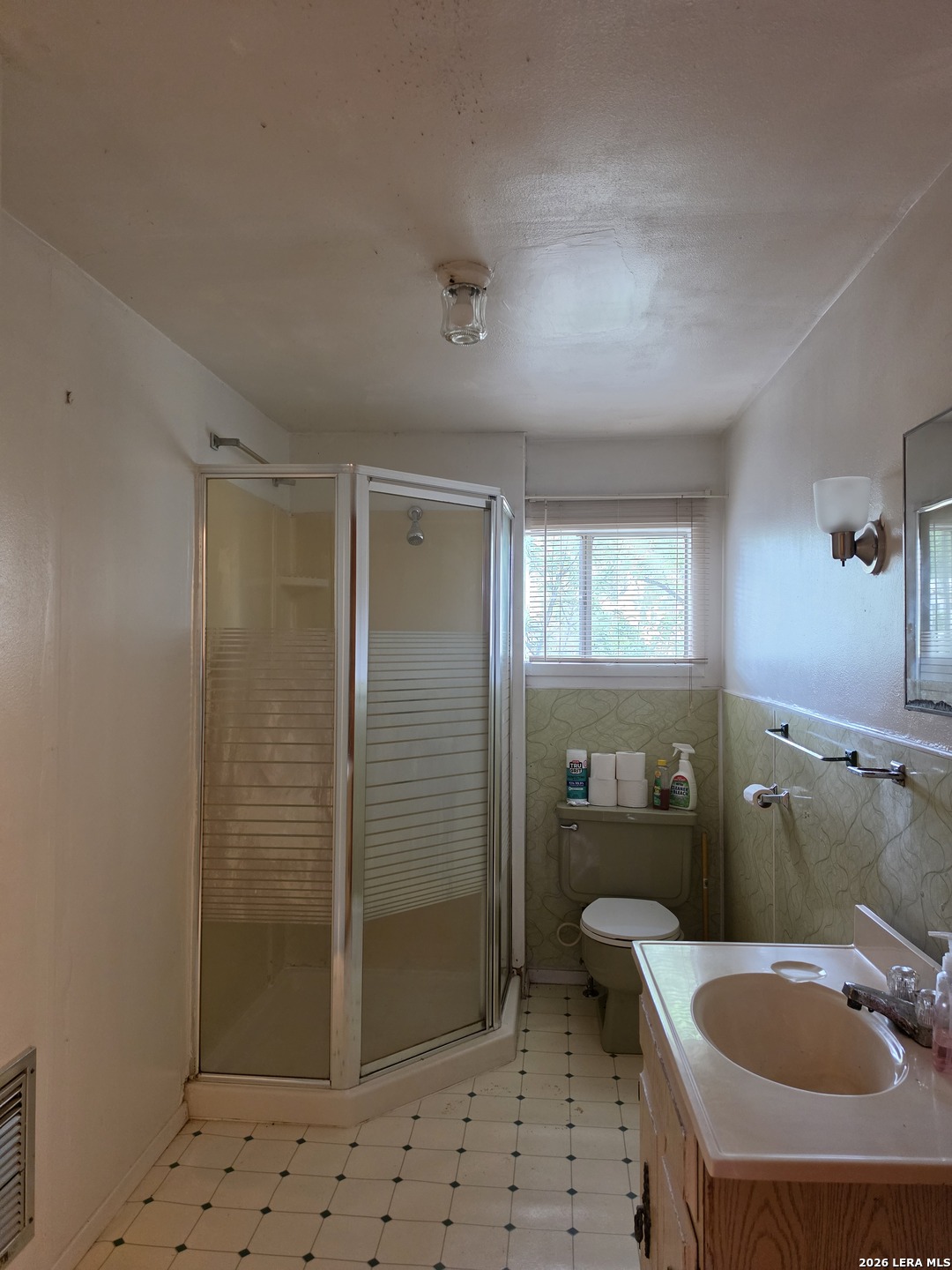 508 Nueces Cotulla, TX 78014 - Photo 11 of 14 a bathroom with a sink toilet and shower