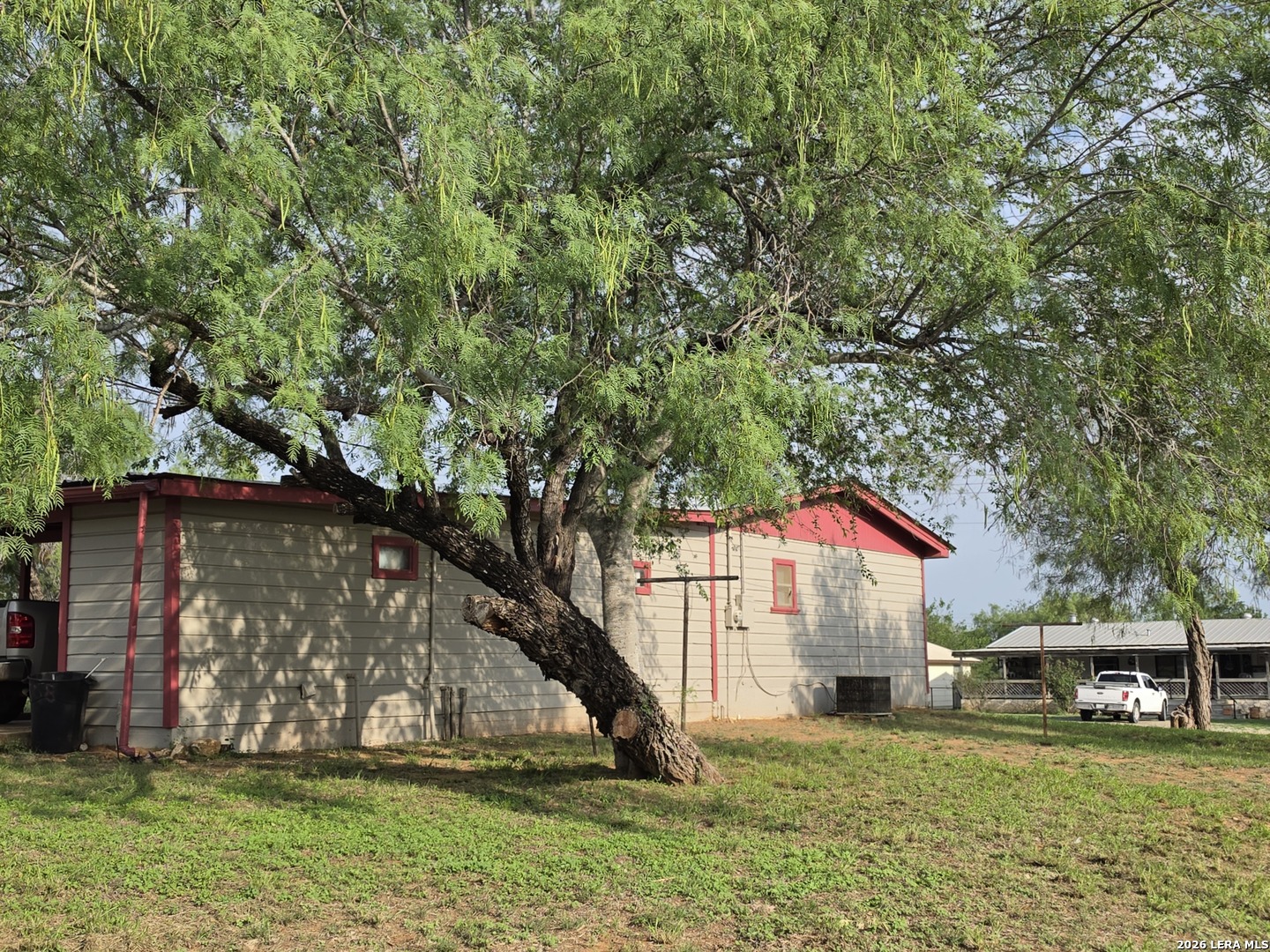 508 Nueces Cotulla, TX 78014 - Photo 3 of 14 a house view with a sitting space and garden