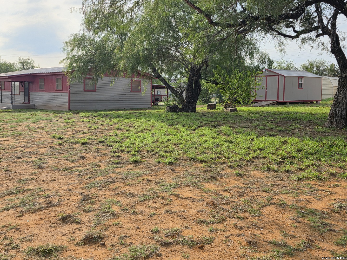 508 Nueces Cotulla, TX 78014 - Photo 5 of 14 a view of a house with a yard