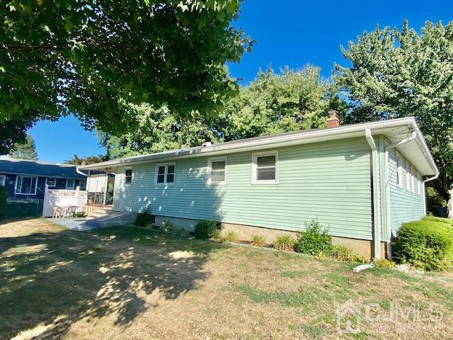 30 Main Street East Brunswick, NJ 08816 - Photo 5 of 40 a view of a house with a yard