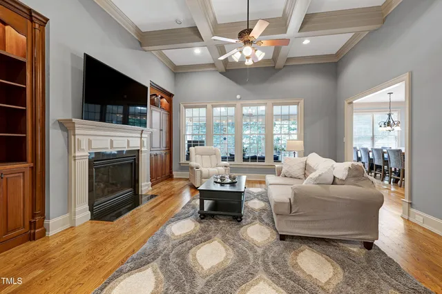 a kitchen with stainless steel appliances granite countertop a sink and a stove