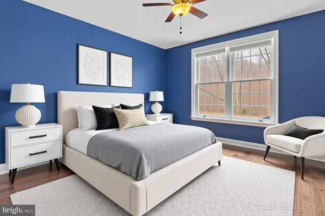 a bathroom with a sink toilet vanity and shower