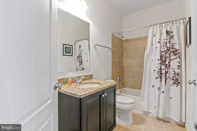 a view of garage and yard