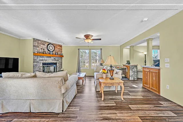 a kitchen with stainless steel appliances granite countertop a sink and cabinets