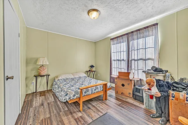 a bathroom with a sink a mirror and a shower