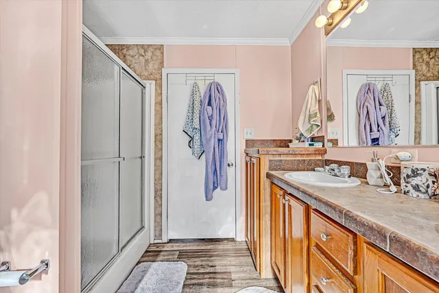 a view of a yard with a large tree