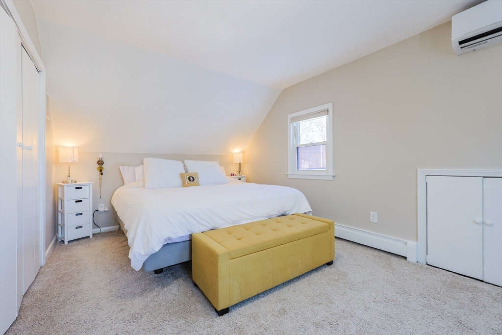 158 Chester Street Worcester, MA 01605 - Photo 22 of 42 a bedroom with a bed and window