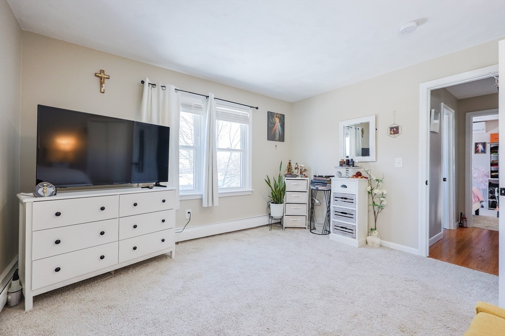 158 Chester Street Worcester, MA 01605 - Photo 25 of 42 a living room with furniture and a flat screen tv