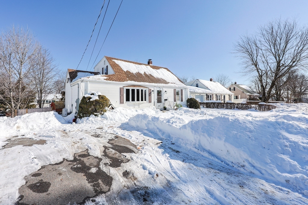 158 Chester Street Worcester, MA 01605 - Photo 42 of 42 a view of a house with a yard covered in snow