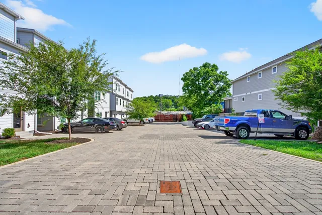a view of a cars parked on the side of a building