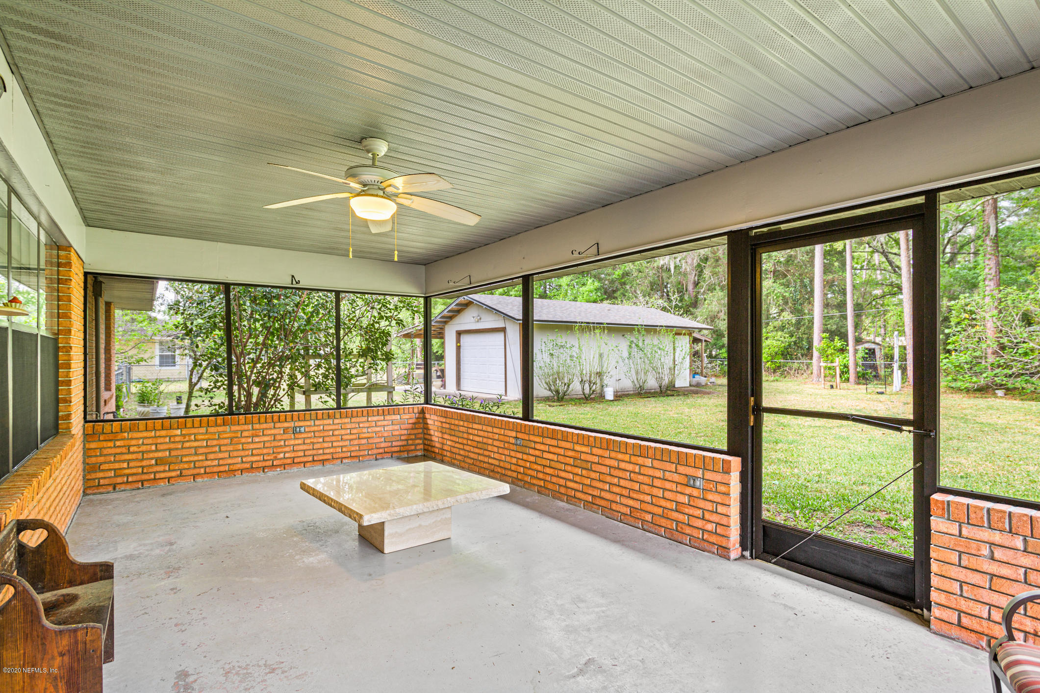 1449 Raiford Road Starke, FL 32091 - Photo 25 of 43 Screened Lanai