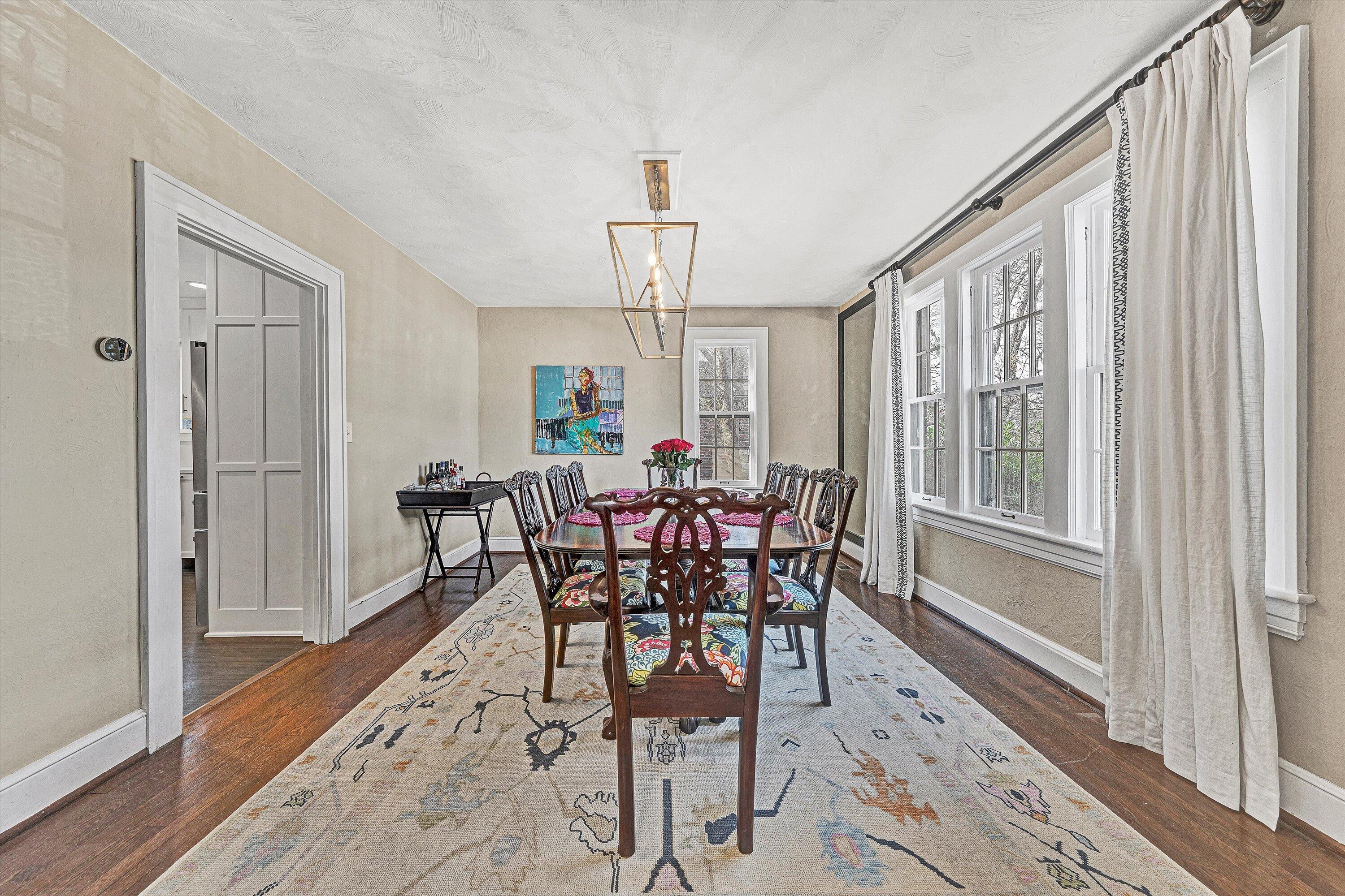 3232 Allendale Street Southwest Roanoke, VA 24014 - Photo 11 of 48 a view of a dining room with furniture window and wooden floor