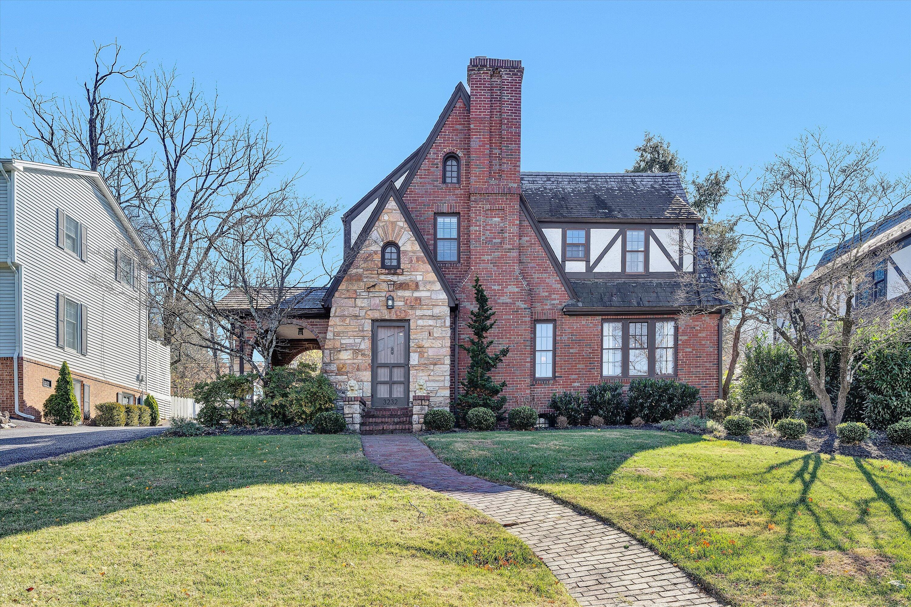 3232 Allendale Street Southwest Roanoke, VA 24014 - Photo 2 of 48 a front view of a house with garden