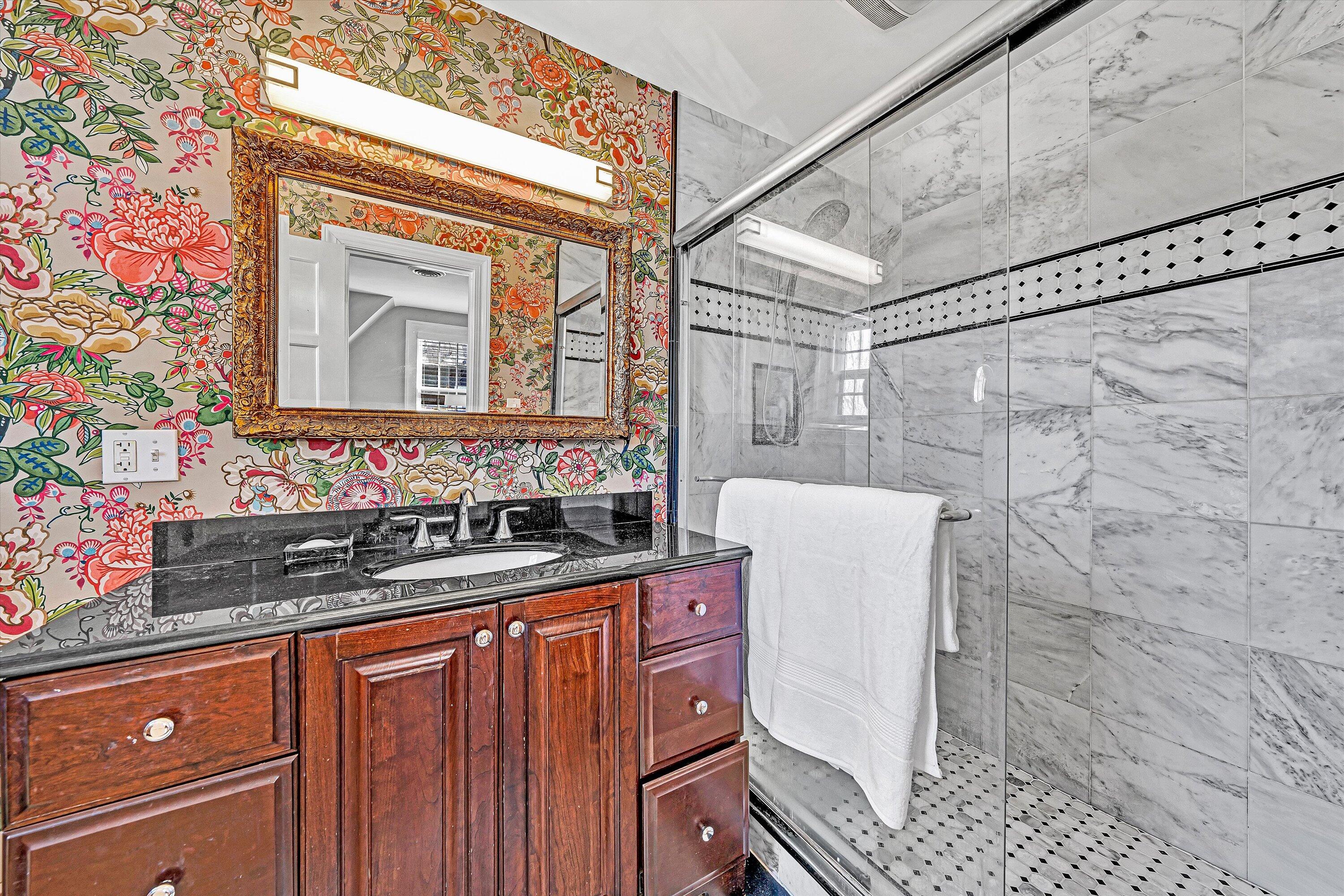 3232 Allendale Street Southwest Roanoke, VA 24014 - Photo 29 of 48 a bathroom with a sink and a mirror