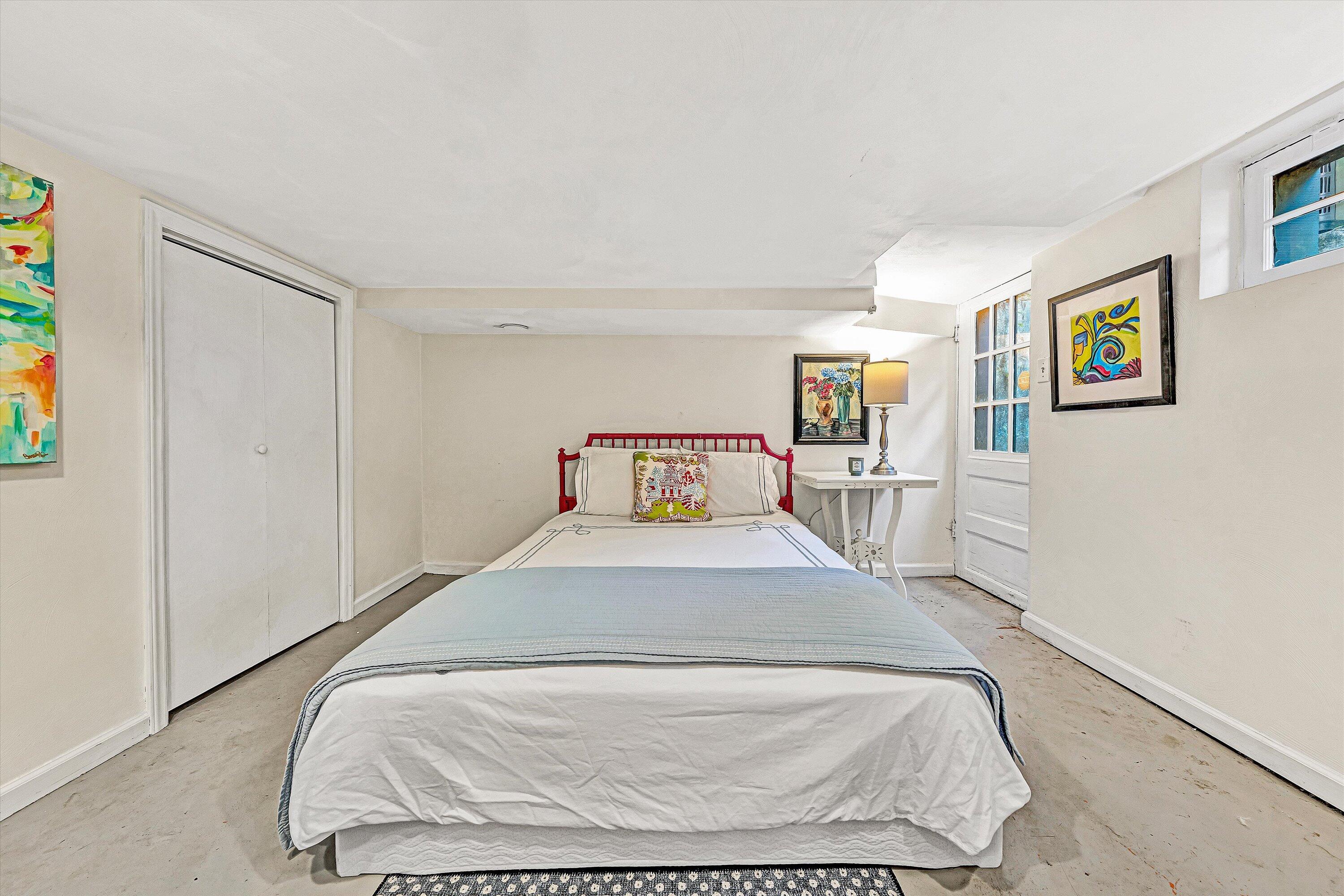 3232 Allendale Street Southwest Roanoke, VA 24014 - Photo 36 of 48 a bedroom with a bed and painting on the wall