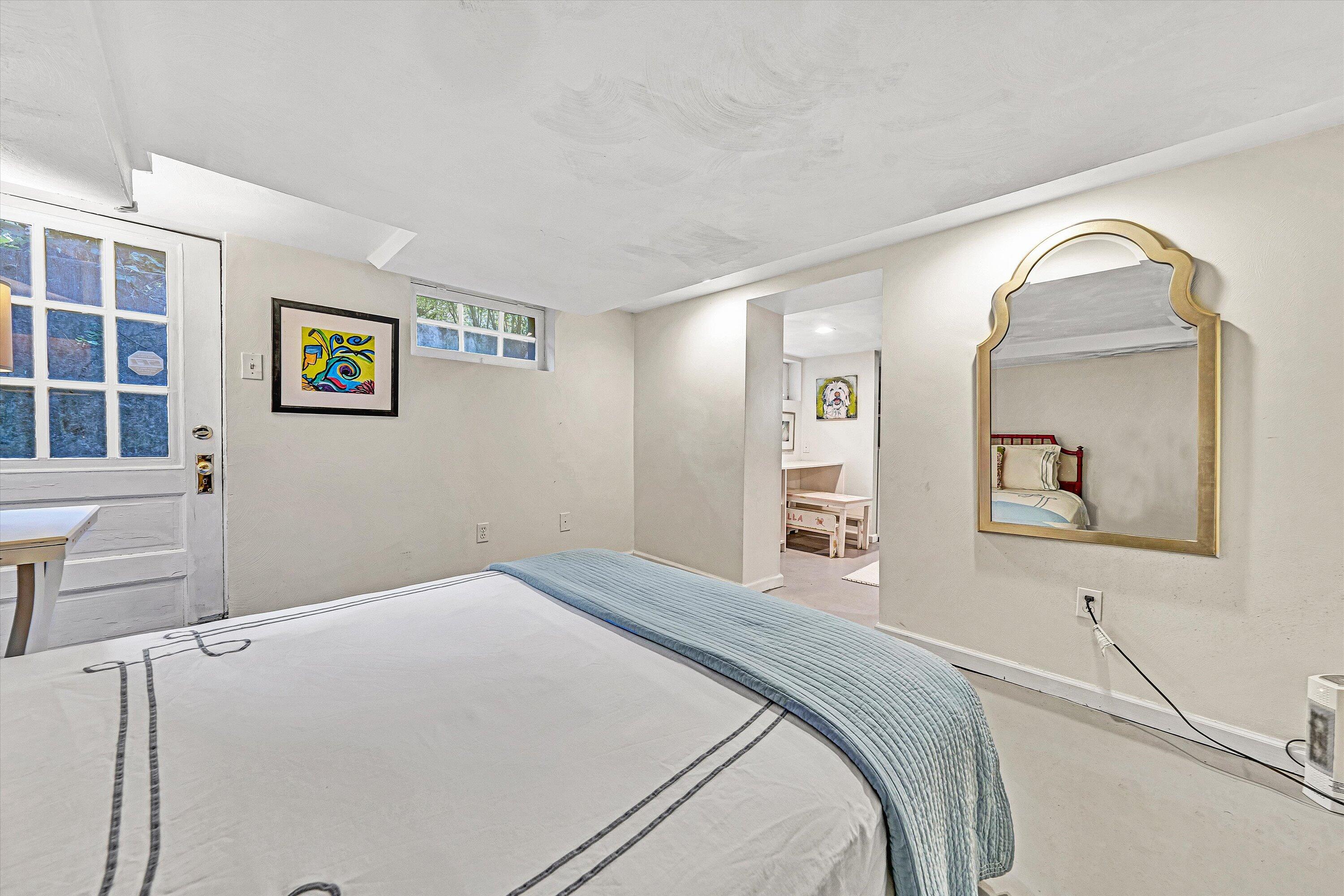 3232 Allendale Street Southwest Roanoke, VA 24014 - Photo 37 of 48 a bedroom with a bed and a painting on the wall