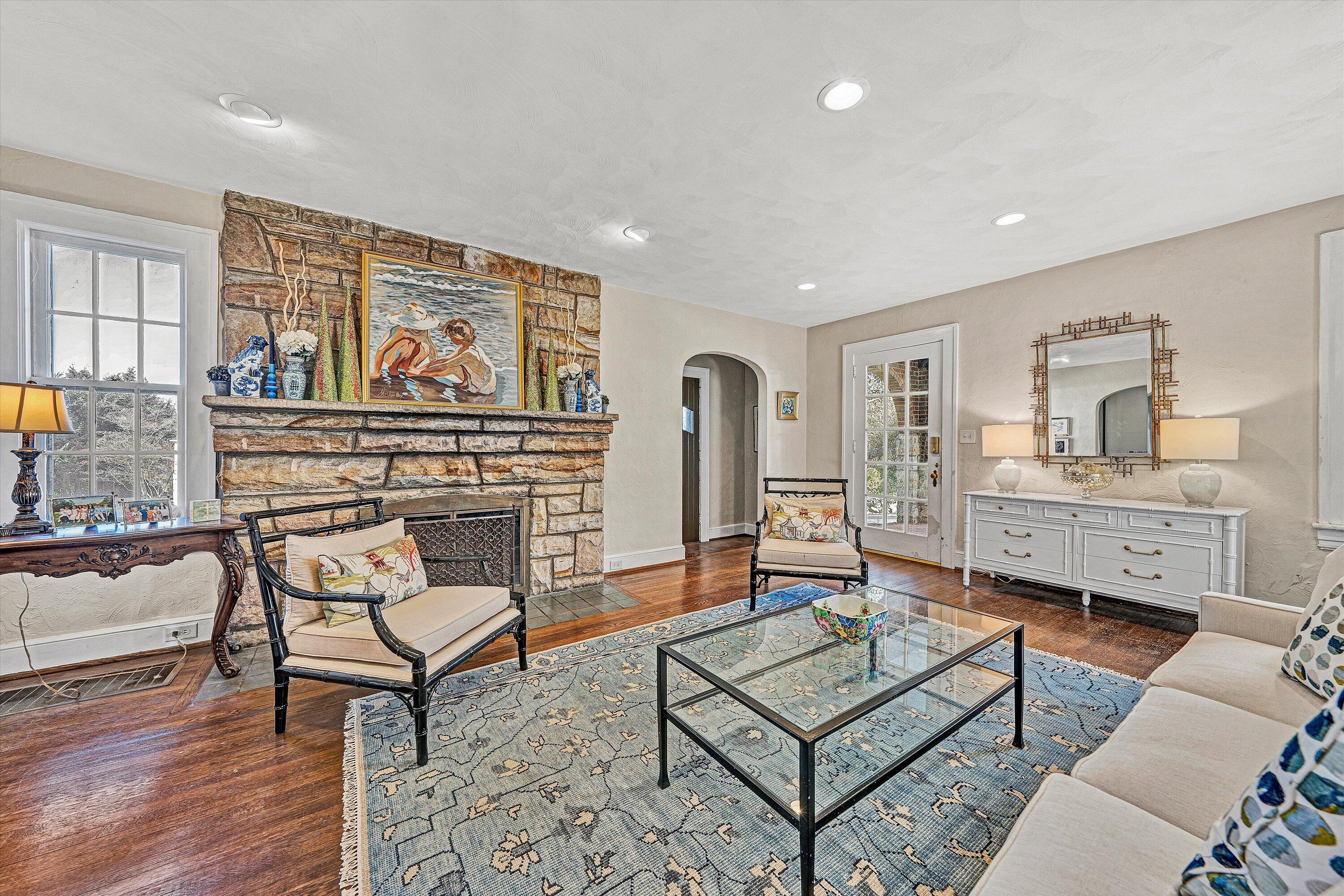 3232 Allendale Street Southwest Roanoke, VA 24014 - Photo 10 of 48 a living room with furniture and a painting on the wall