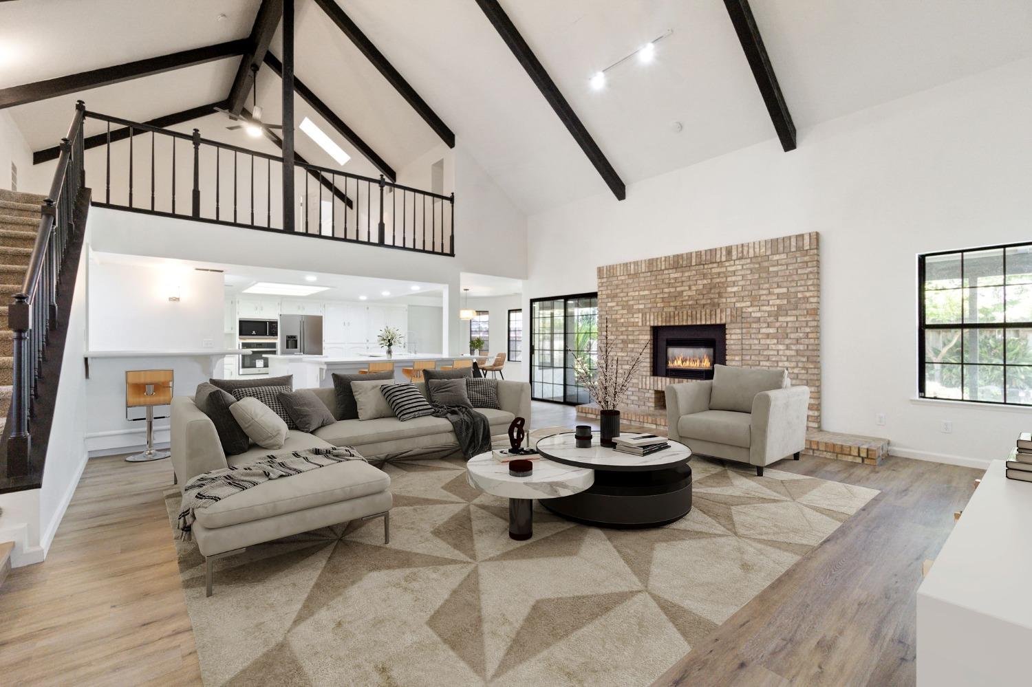 1965 Swift Avenue Clovis, CA 93611 - Photo 2 of 43 a living room with furniture and a fireplace
