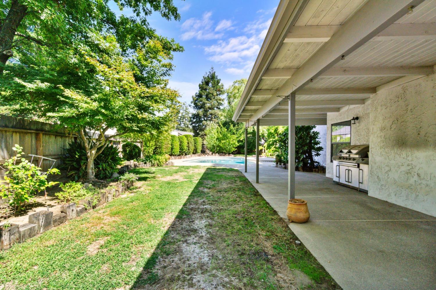 1965 Swift Avenue Clovis, CA 93611 - Photo 34 of 43 a view of yard with swimming pool
