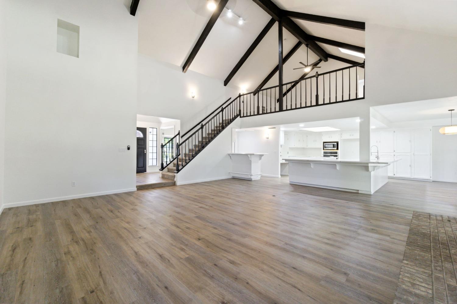 1965 Swift Avenue Clovis, CA 93611 - Photo 9 of 43 a view of entryway and hall with wooden floor