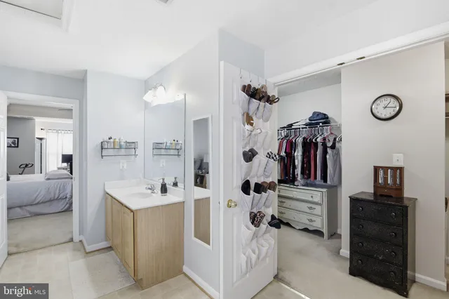 a view of bathroom with dual sinks