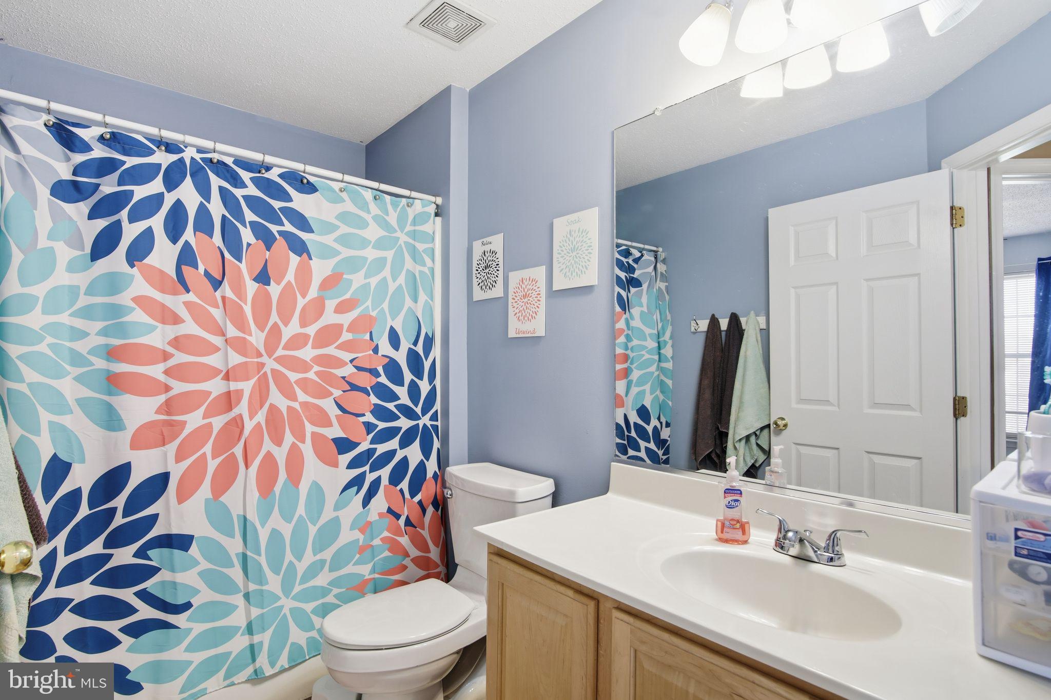 3 Rixey Court Fredericksburg, VA 22405 - Photo 22 of 31 a bathroom with a sink and a mirror