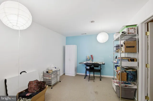 a room with furniture and a mirror