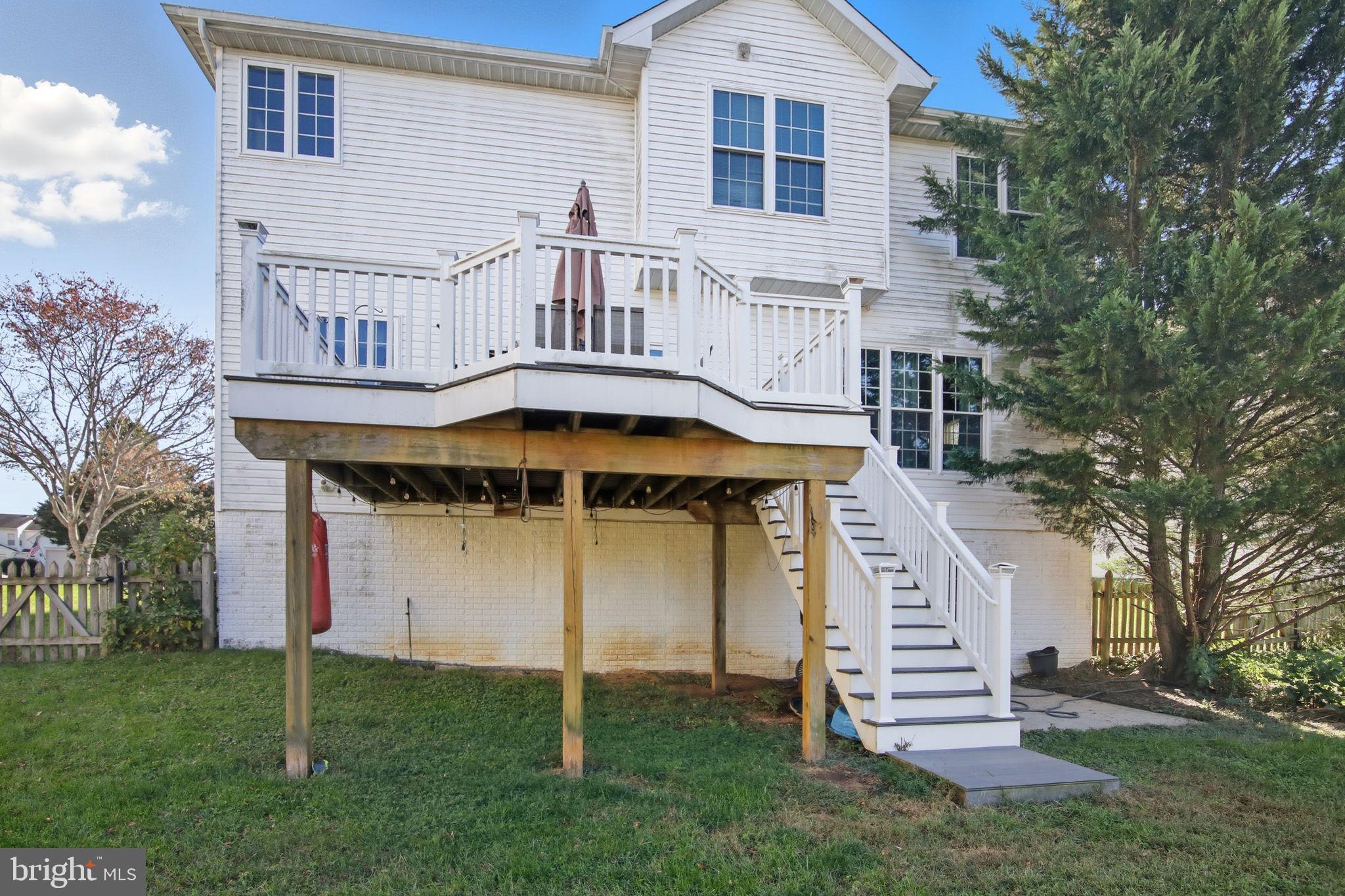 3 Rixey Court Fredericksburg, VA 22405 - Photo 30 of 31 a front view of a house with a garden