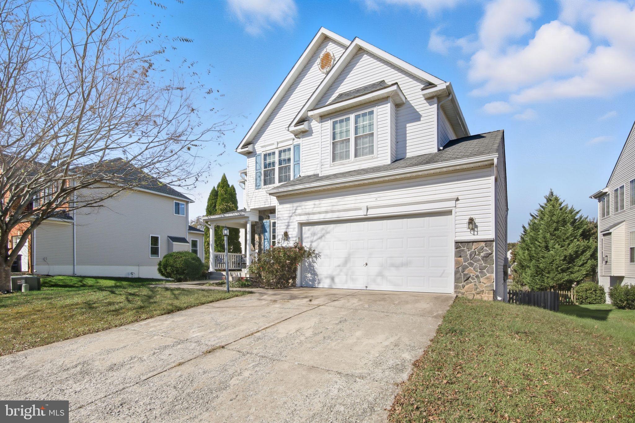 3 Rixey Court Fredericksburg, VA 22405 - Photo 31 of 31 a front view of a house with a yard and garage