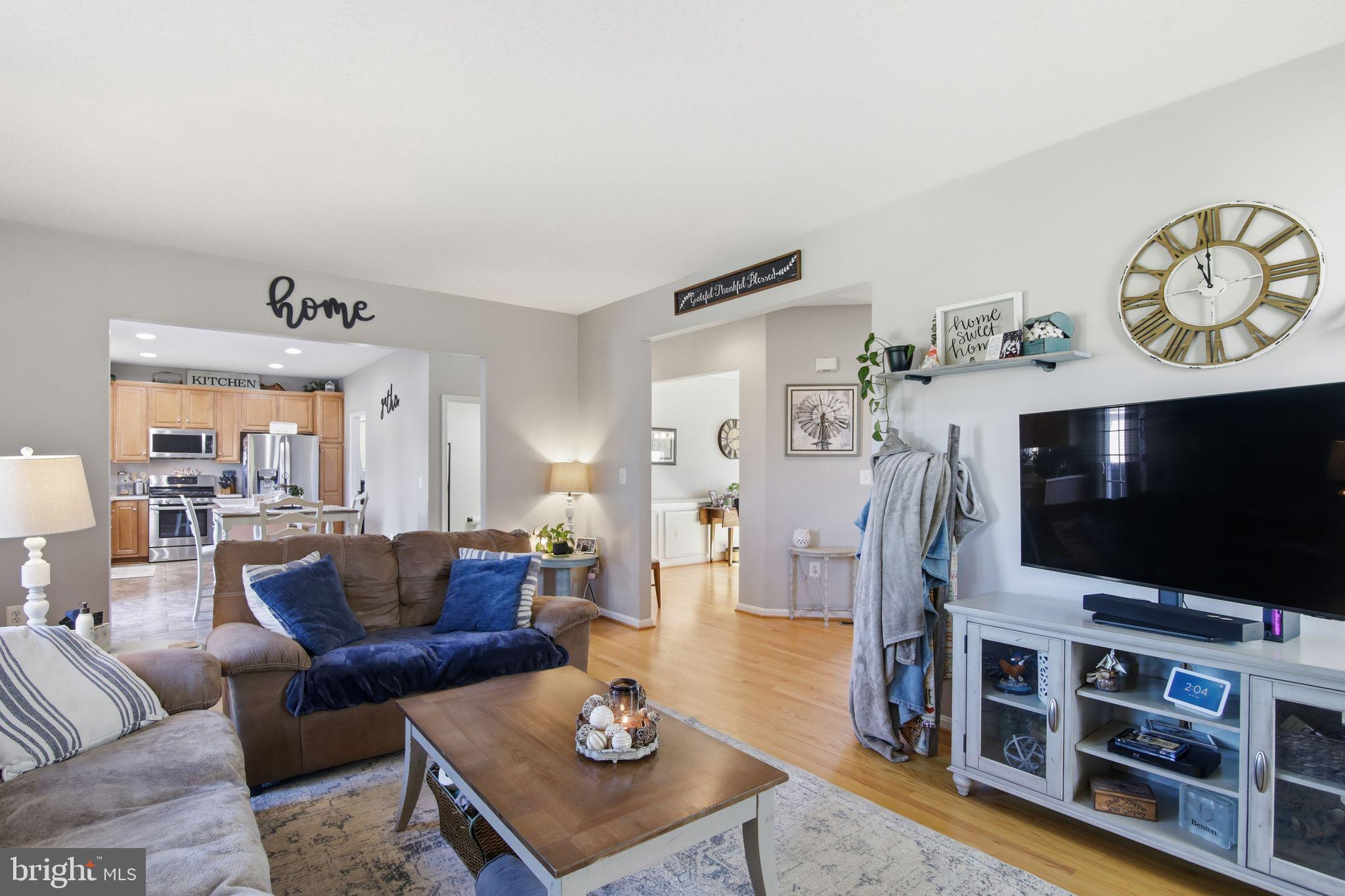 3 Rixey Court Fredericksburg, VA 22405 - Photo 5 of 31 a living room with furniture and a flat screen tv