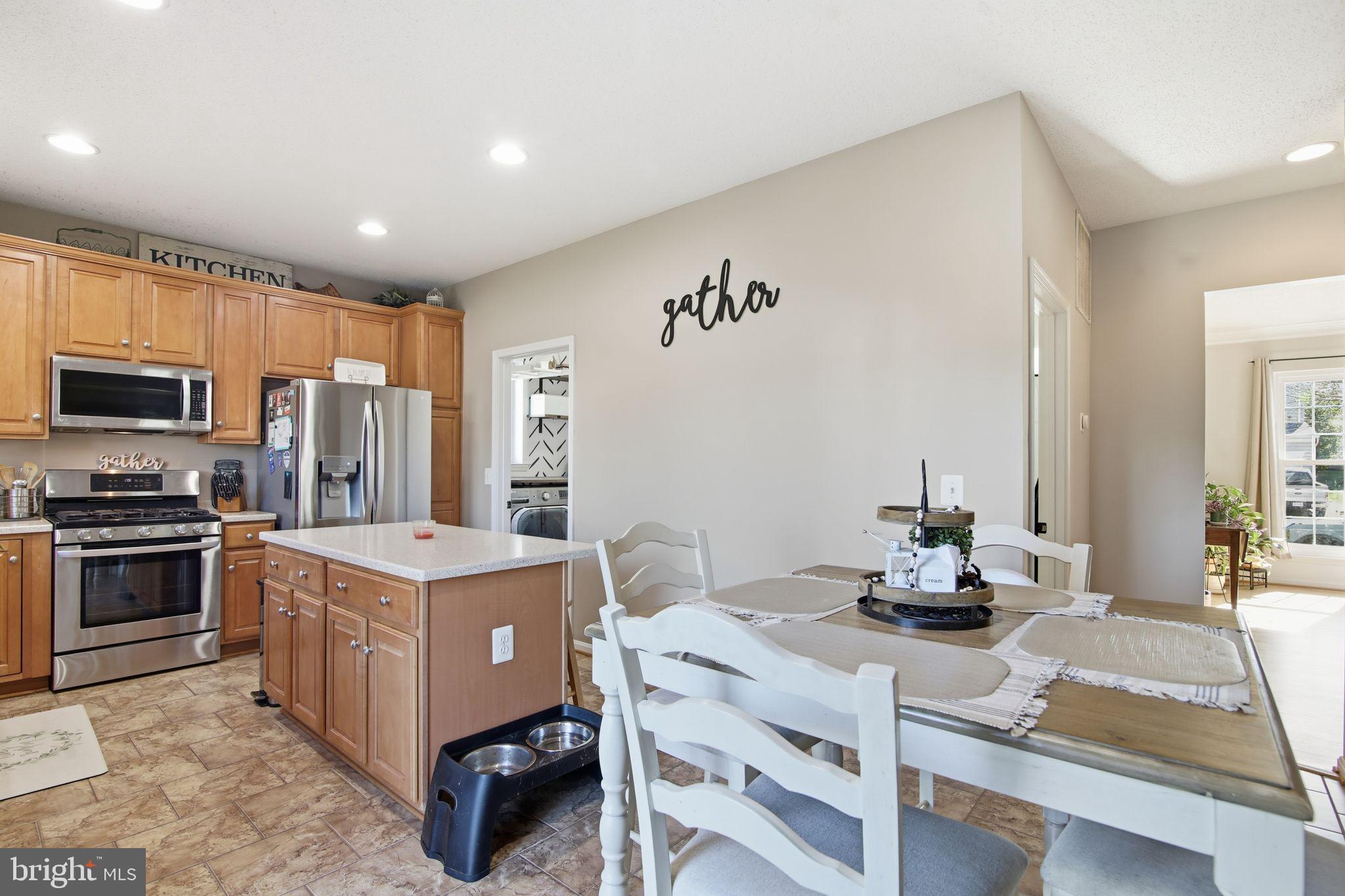 3 Rixey Court Fredericksburg, VA 22405 - Photo 7 of 31 a kitchen that has a lot of cabinets in it and appliances