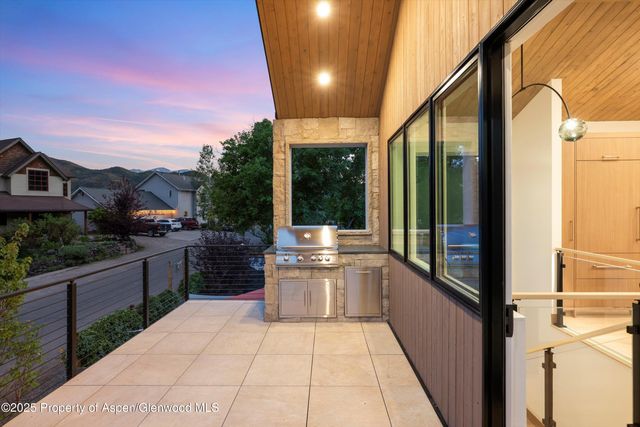 a view of a house with a big yard