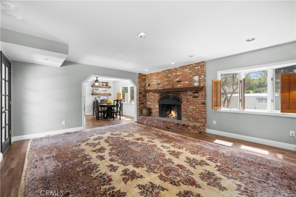 24405 Derian Drive Newhall, CA 91321 - Photo 10 of 36 a living room with furniture and a fireplace