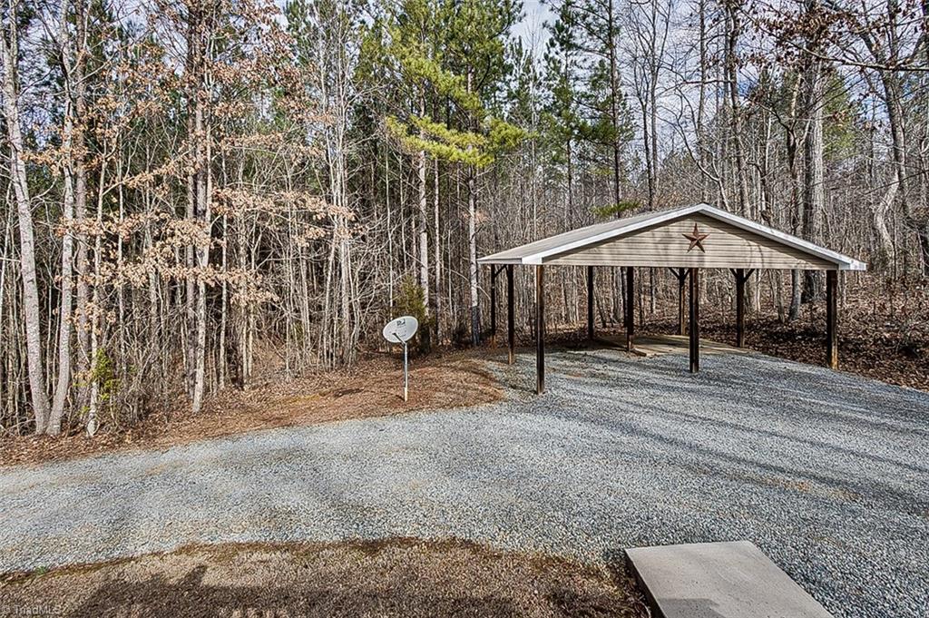 404 Kennedy Farm Road South Trinity, NC 27370 - Photo 24 of 29 Carport with graveled drive right off the back deck