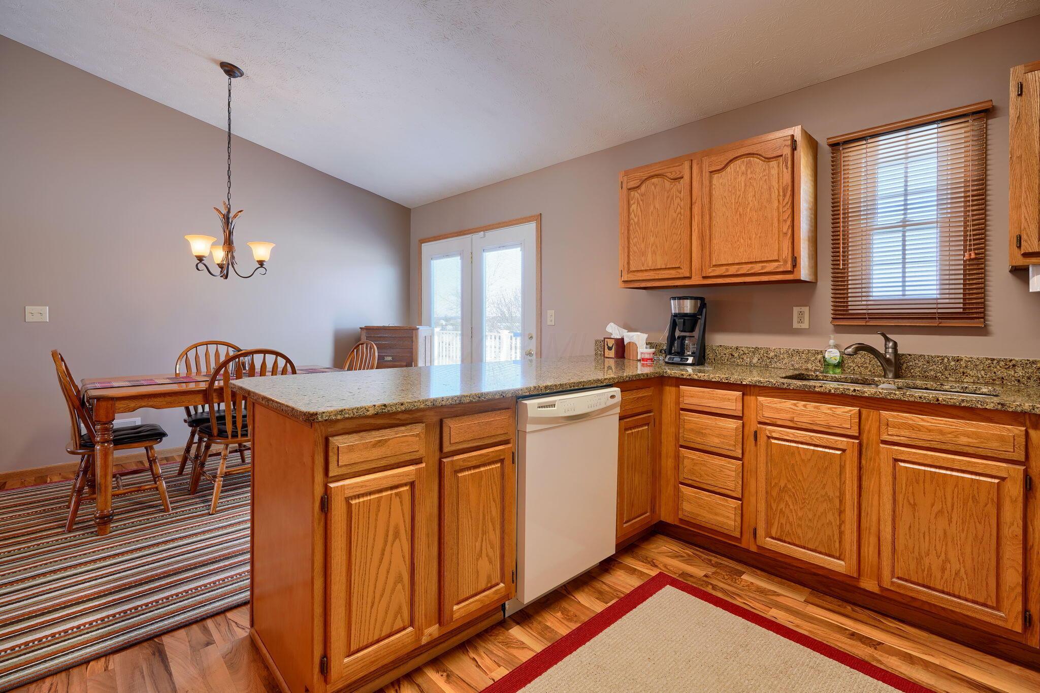 4270 Winchester Southern Road Circleville, OH 43113 - Photo 12 of 61 CATHEDRAL CEILING DINING ROOM OPEN TO KITCHEN