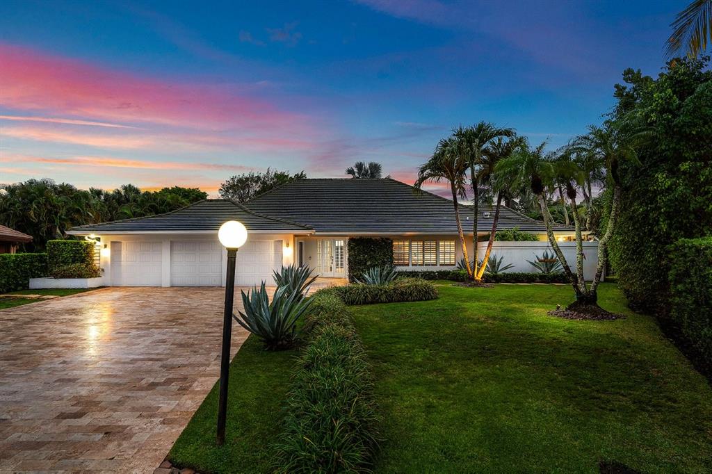 17844 Scarsdale Way Boca Raton, FL 33496 - Photo 2 of 38 a front view of a house with a yard
