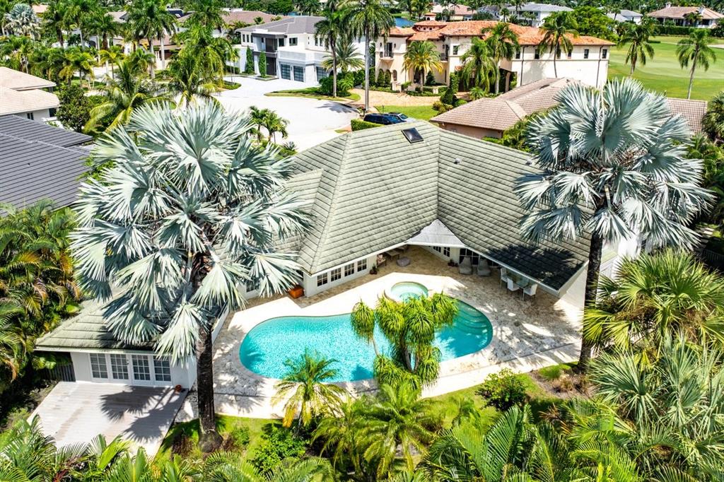 17844 Scarsdale Way Boca Raton, FL 33496 - Photo 30 of 38 a view of a swimming pool with a patio