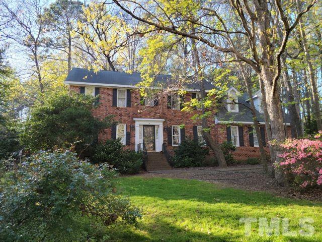 7817 Hardwick Drive Raleigh, NC 27615 - Photo 1 of 23 a front view of a house with garden
