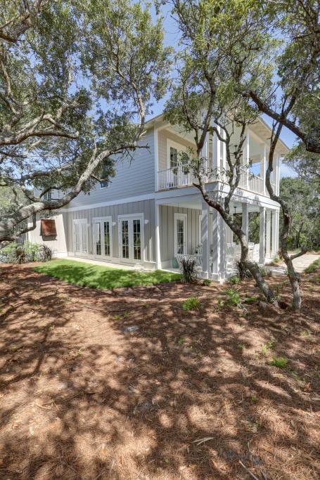 10 Sea Grade Road Santa Rosa Beach, FL 32459 - Photo 2 of 51 a front view of a house with a garden