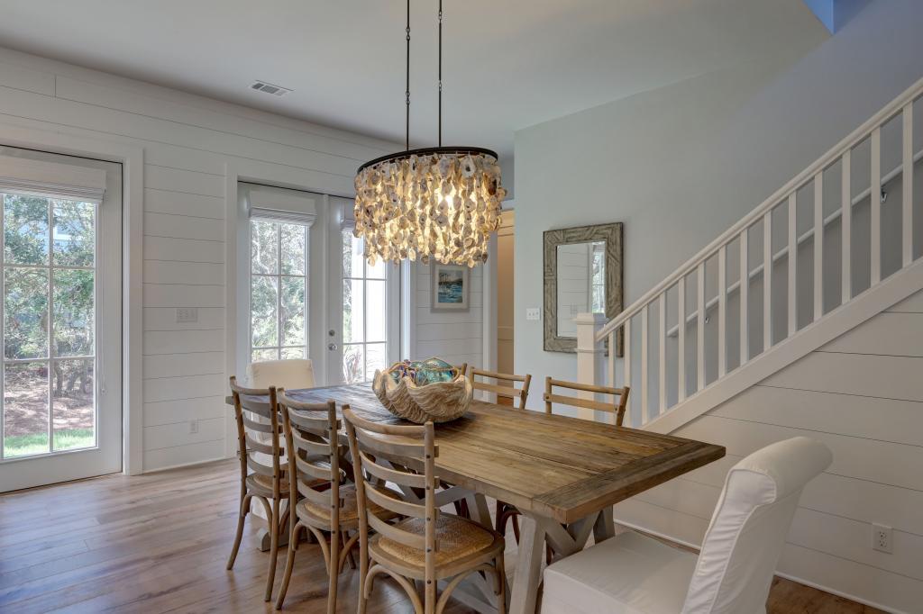 10 Sea Grade Road Santa Rosa Beach, FL 32459 - Photo 15 of 51 a view of a dining room with furniture window and wooden floor