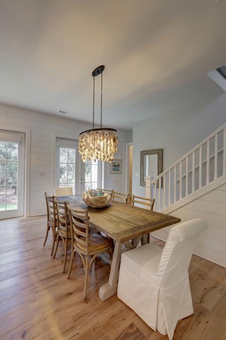 10 Sea Grade Road Santa Rosa Beach, FL 32459 - Photo 16 of 51 a view of a dining room with furniture window and wooden floor