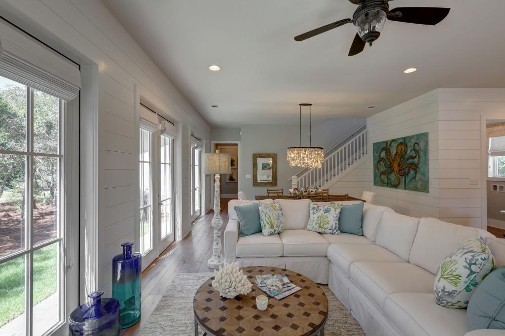 10 Sea Grade Road Santa Rosa Beach, FL 32459 - Photo 24 of 51 a living room with furniture and a large window